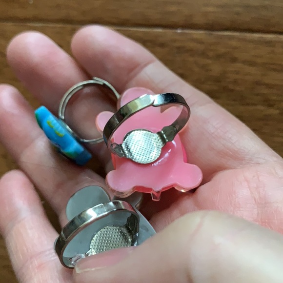 Lot of rings, bracelets and fluff ball keychain - Picture 2 of 2